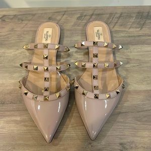 Blush rockstud Valentino sandals.